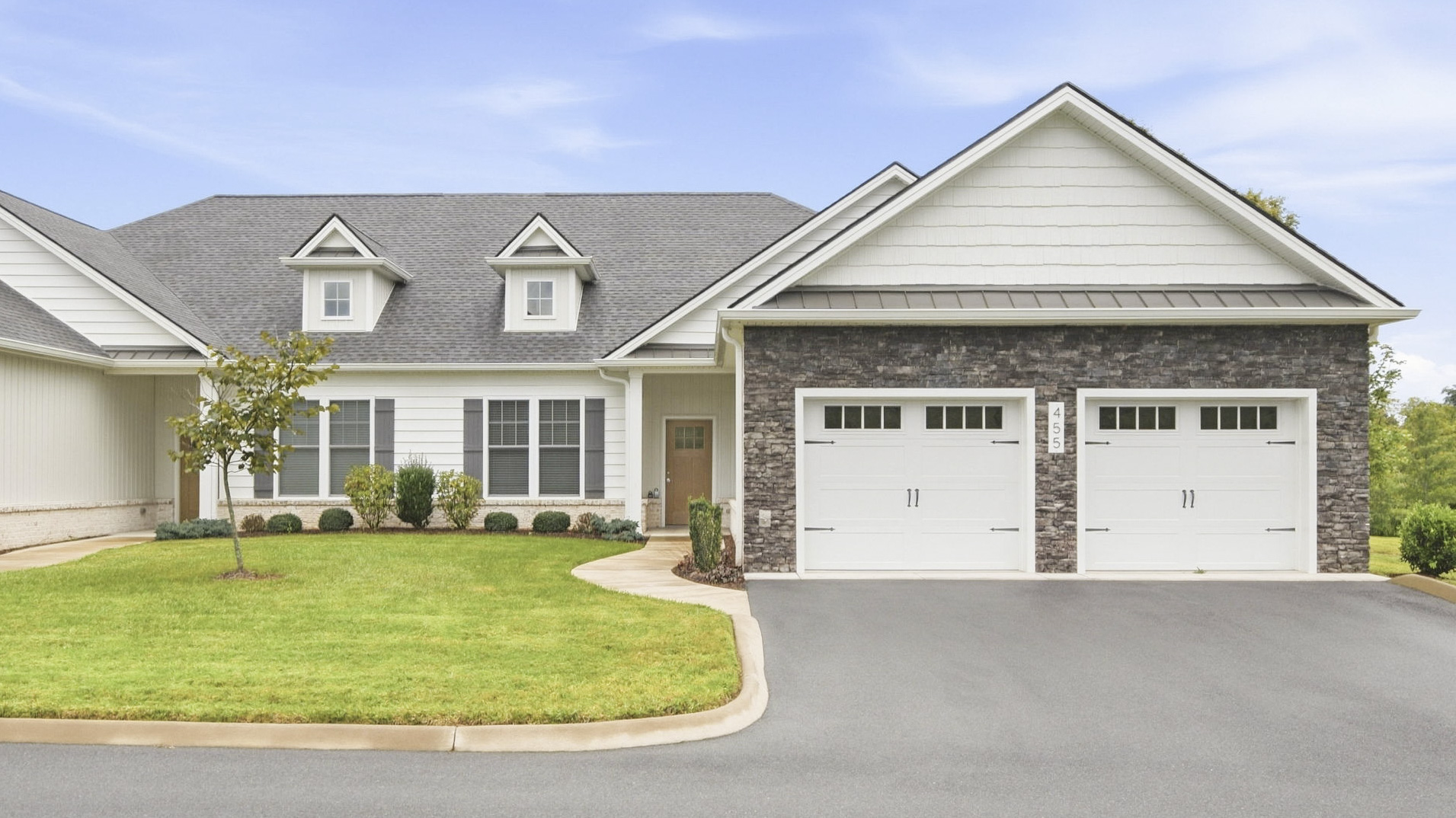 Spacious one-level rental home with private entrance and attached two-car garage.