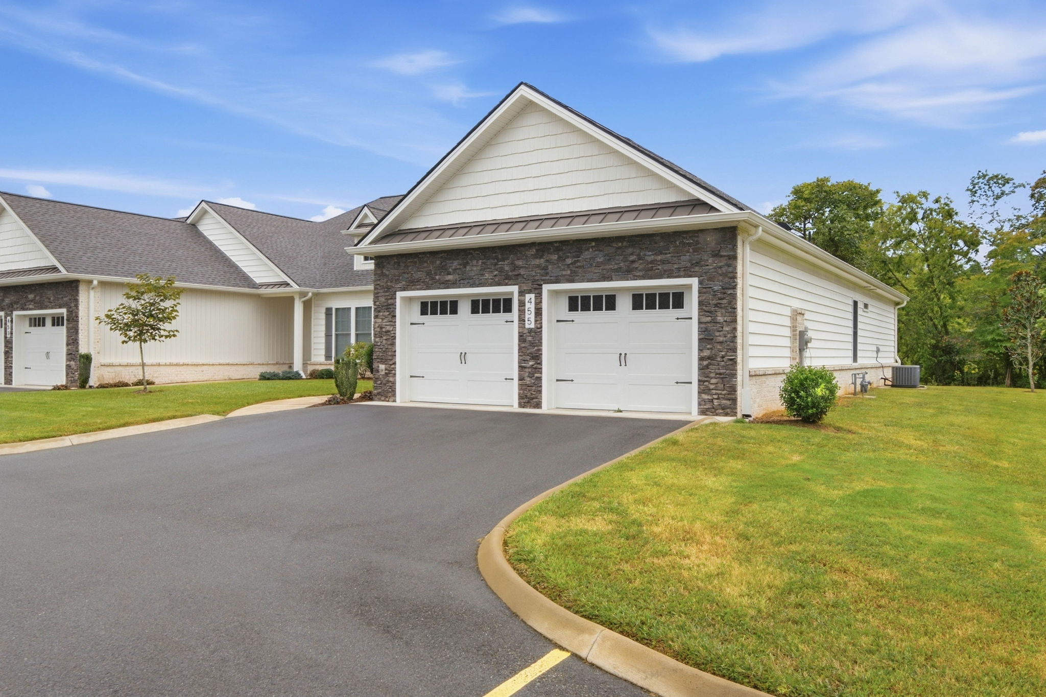Private attached two-car garage with direct entry and valuable additional storage.