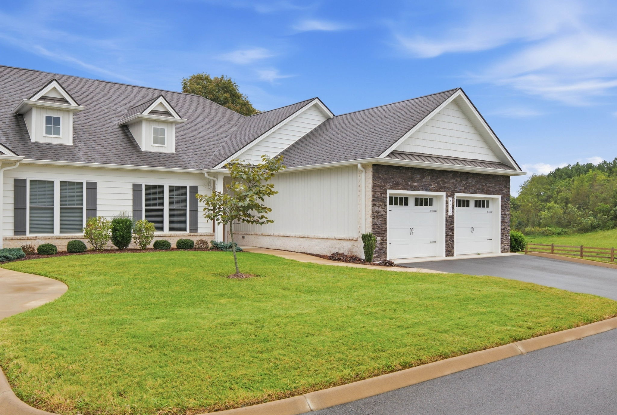 One-level home-like living with a private two-car garage in a quiet residential setting.